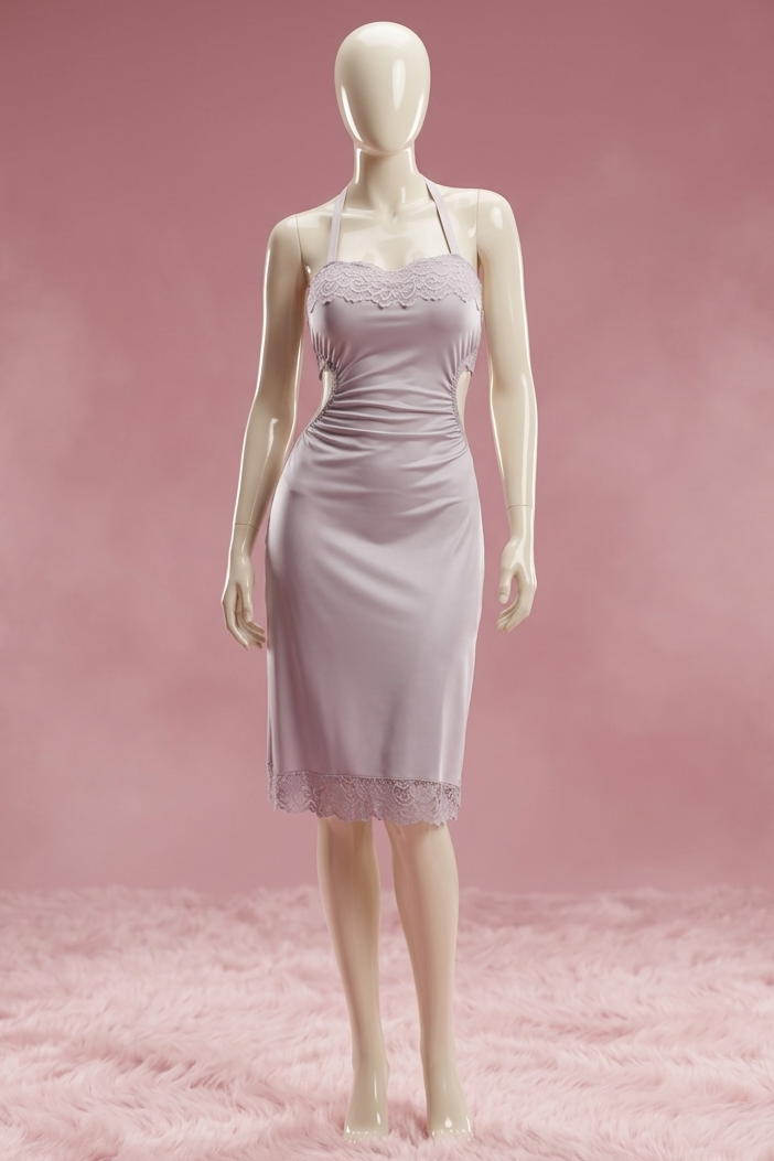 Mannequin wearing a light purple dress on a pink textured background