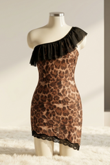 Leopard print dress with black ruffle on a mannequin against a neutral background
